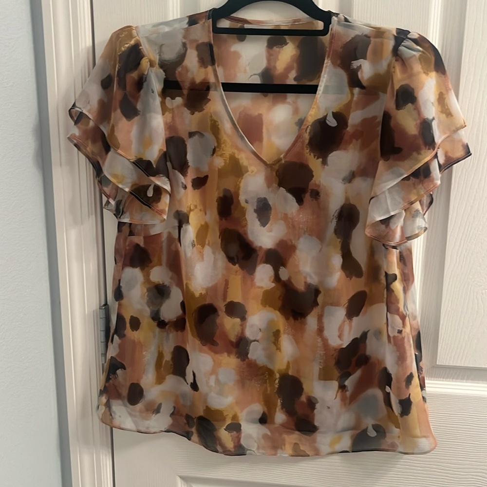 Beautiful cabi top, like new